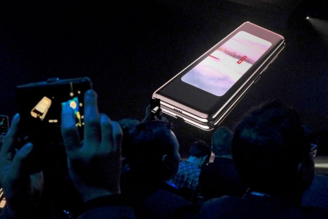 file photo the samsung galaxy fold phone is shown on a screen at samsung electronics co ltd s unpacked event in san francisco california u s feb 20 2019 photo reuters file photo the samsung galaxy fold phone is shown on a screen at samsung electronics co ltd s unpacked event in san francisco california u s feb 20 2019 photo reuters