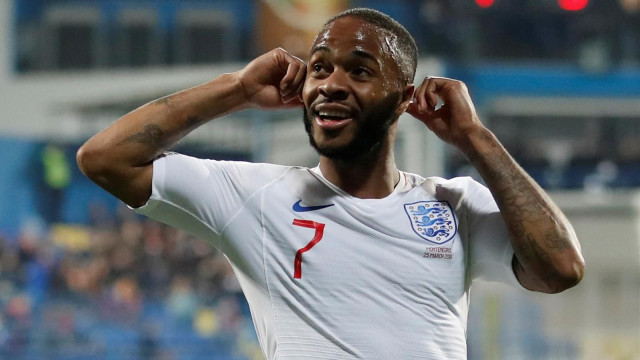 sterling cupped his hands to his ears in response to derogatory chants from montenegro fans while playing for england last month photo afp sterling cupped his hands to his ears in response to derogatory chants from montenegro fans while playing for england last month photo afp