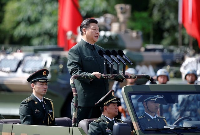 xi jinping inspects troops in hong kong during a 2017 event marking the 20th anniversary of the city 039 s handover from british rule photo reuters