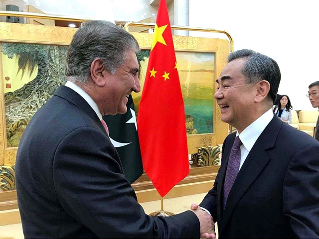 foreign minister qureshi holds talks with chinese counterpart wang yi in beijing photo app