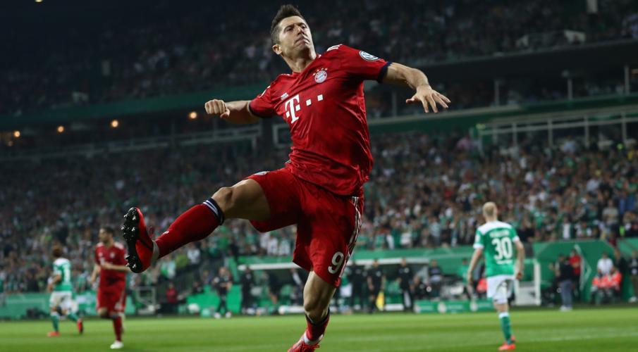 lewandowski scored twice in a highly entertaining last four tie to reach the final for the 23rd time photo afp