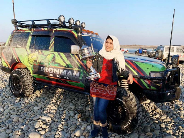 salma khan marwat with her ride and trophy after winning chakwal 4 4 challenge off road rally photo express salma khan marwat with her ride and trophy after winning chakwal 4 4 challenge off road rally photo express