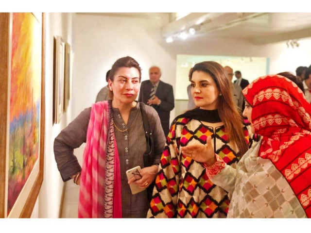 kashmala tariq viewing artwork after inaugurating dr masooma abbas s painting exhibition photo express kashmala tariq viewing artwork after inaugurating dr masooma abbas s painting exhibition photo express