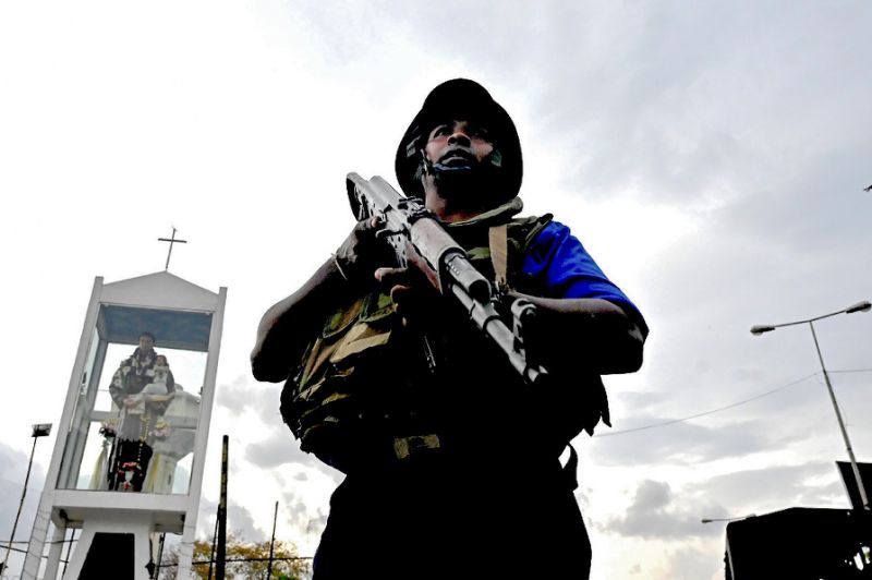 the sri lankan government imposed a state of emergency which gave police and the military special powers to counter militant strikes photo afp