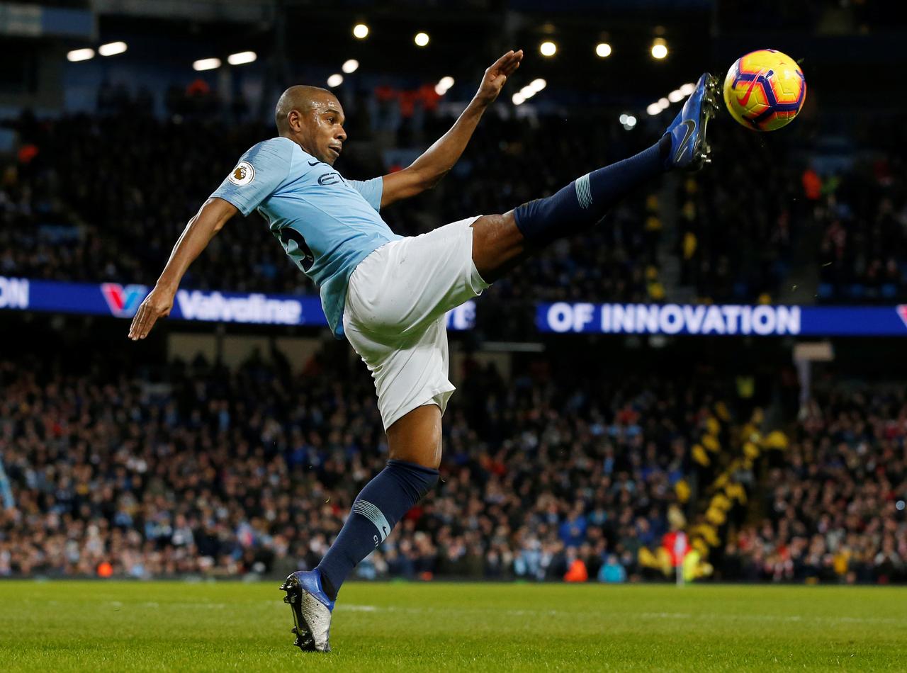 victory in the final three games of the season will ensure a fourth league crown in eight years and fernandinho said city 039 s display at united showed how determined they were to succeed photo reuters