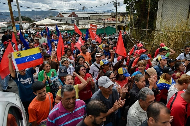 government supporters hold a rally in support of venezuelan president nicolas maduro on january 26 2019 in caracas photo afp