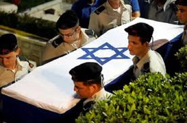 people carry the coffin of zachary baumel a u s born israeli soldier missing since a 1982 tank battle against syrian forces and whose remains were recently recovered by israel during his funeral at the mount herzl military cemetery in jerusalem photo reuters people carry the coffin of zachary baumel a u s born israeli soldier missing since a 1982 tank battle against syrian forces and whose remains were recently recovered by israel during his funeral at the mount herzl military cemetery in jerusalem photo reuters