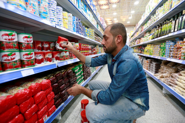 tehran is trying to cope with impact of tighter sanctions imposed by us photo reuters tehran is trying to cope with impact of tighter sanctions imposed by us photo reuters