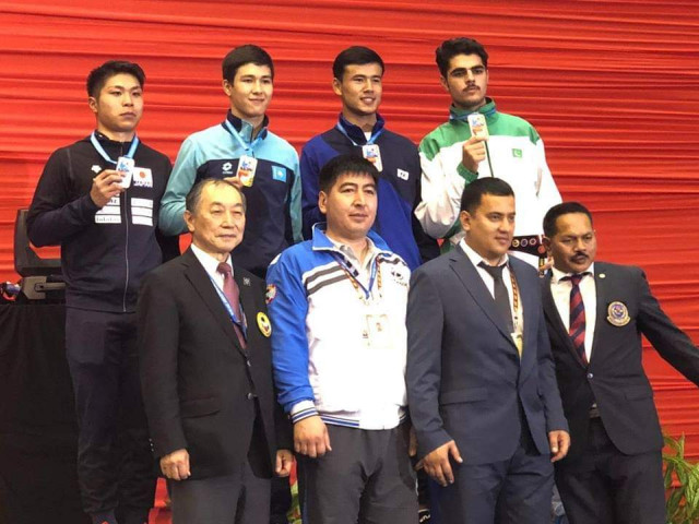 owais upper row right corner posing with his medal photo courtesy pkf owais upper row right corner posing with his medal photo courtesy pkf