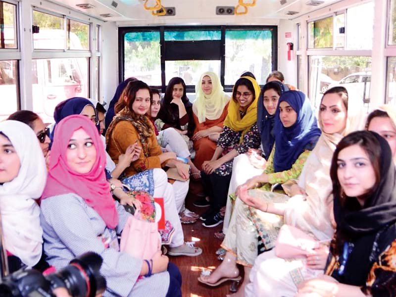 mpas maleeha ali asghar and momina basit sit in pink bus along with other guests photo nni