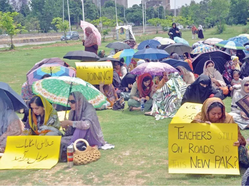 daily wages teachers protest against non payment of salaries outside fde office in islamabad photo zafar aslam express daily wages teachers protest against non payment of salaries outside fde office in islamabad photo zafar aslam express