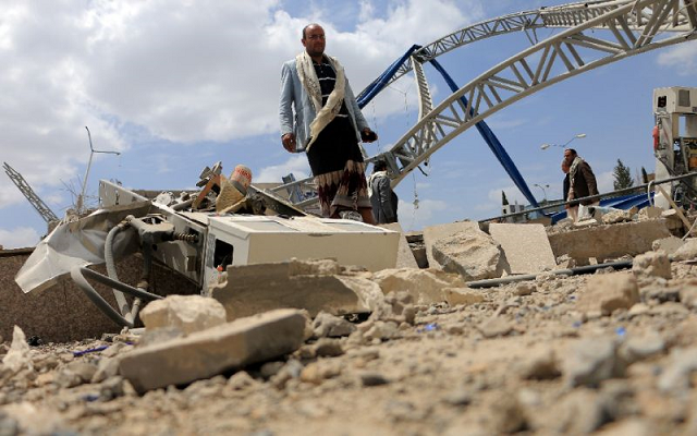 men inspect a damaged petrol station after it was hit by a previous alleged saudi led coalition airstrike on the outskirts the yemeni capital sanaa on may 21 2018 photo afp men inspect a damaged petrol station after it was hit by a previous alleged saudi led coalition airstrike on the outskirts the yemeni capital sanaa on may 21 2018 photo afp
