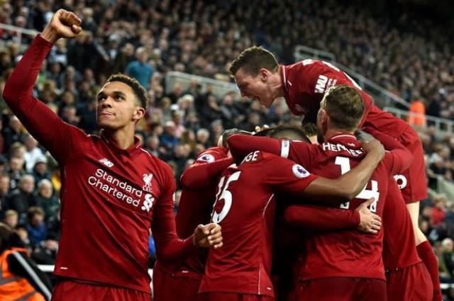 in a recurring theme of a thrilling title race liverpool dug deep late on to continue asking questions of the champions by moving two points ahead of city once more photo afp in a recurring theme of a thrilling title race liverpool dug deep late on to continue asking questions of the champions by moving two points ahead of city once more photo afp