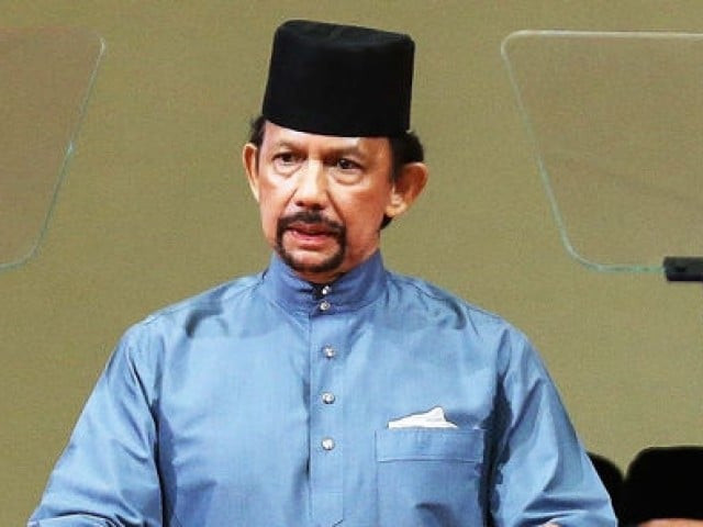 brunei 039 s sultan hassanal bolkiah delivers a speech during the official ceremony of the implementation of sharia law in bandar seri begawan photo afp file