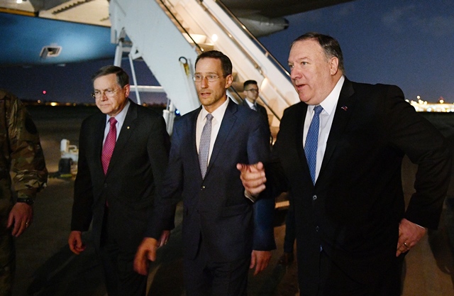 us secretary of state mike pompeo r walks with acting assistant secretary for near eastern affairs at the state department david satterfield l and charge d 039 affaires at the us embassy in baghdad joey hood upon arrival in baghdad for meetings pompeo is scheduled to meet with the iraqi prime minister and president photo afp