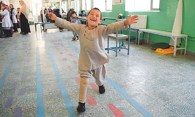 young afghan amputee s joy at dancing on new leg