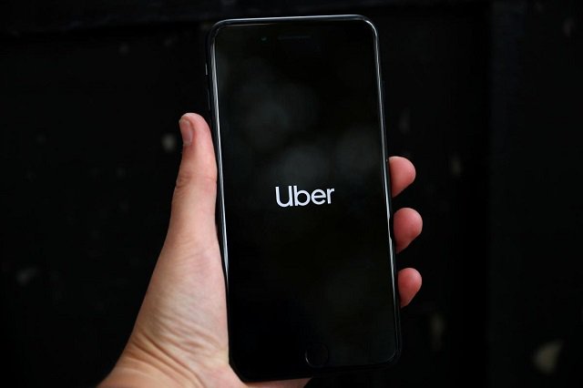 uber 039 s logo is displayed on a mobile phone in london britain september 14 2018 photo reuters
