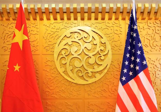 us officials accuse chinese counterparts of retreating from major planks of an agreement photo file