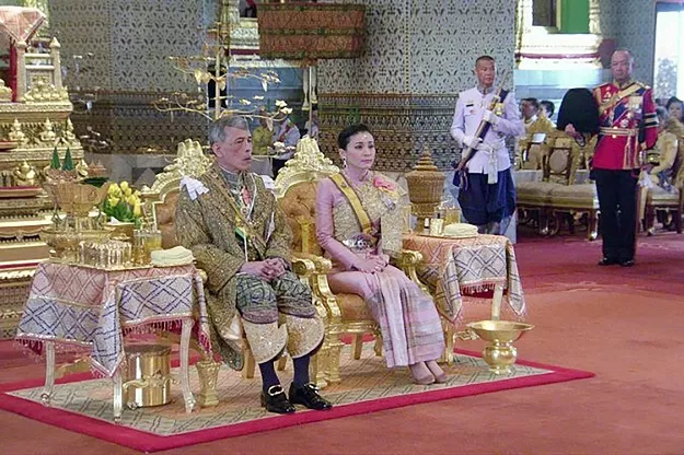 this handout from the thai royal household bureau taken and released on may 4 2019 shows thailand 039 s king maha vajiralongkorn sitting beside queen suthida during his coronation in bangkok photo afp this handout from the thai royal household bureau taken and released on may 4 2019 shows thailand 039 s king maha vajiralongkorn sitting beside queen suthida during his coronation in bangkok photo afp