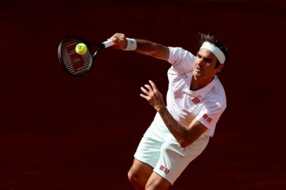 federer saves two match points in madrid osaka crashes out