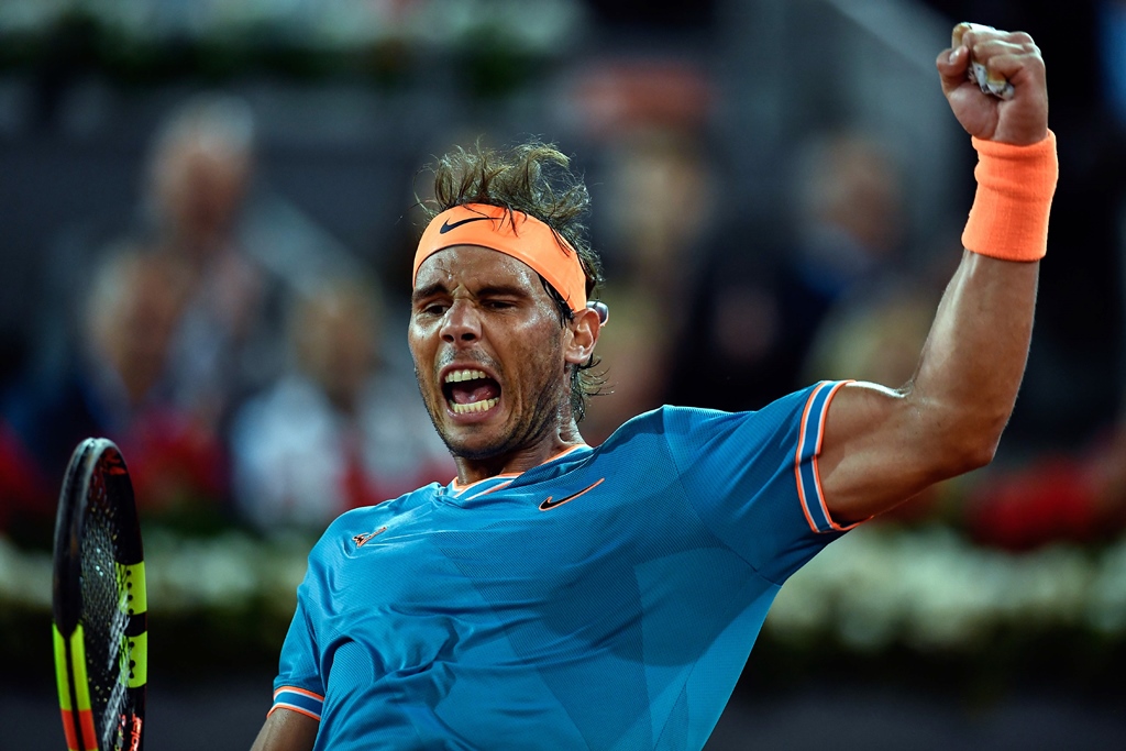 dominance federer nadal and djokovic all await their quarter final opponents as the trio looks in form to fight for the clay title photo afp