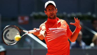 djokovic into madrid semis as cilic withdraws ill
