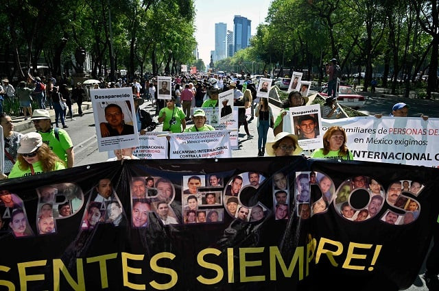activists and relatives of missing people march to demand the mexican government answers on the whereabouts of their loved one as part of the commemoration of mothers 039 day in mexico city on may 10 2019 mexico a country ravaged by the violence of drug trafficking cartels recorded 33 513 missing persons until 2017 according to official figures one of the most emblematic cases was the disappearance and presumed massacre of 43 students in guerrero state in 2014 photo afp activists and relatives of missing people march to demand the mexican government answers on the whereabouts of their loved one as part of the commemoration of mothers 039 day in mexico city on may 10 2019 mexico a country ravaged by the violence of drug trafficking cartels recorded 33 513 missing persons until 2017 according to official figures one of the most emblematic cases was the disappearance and presumed massacre of 43 students in guerrero state in 2014 photo afp