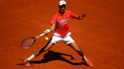 djokovic nadal reach madrid semi finals as federer crashes out