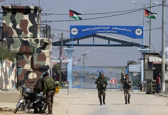 in this file photo hamas security forces stand guard at erez border crossing into israel in the northern gaza strip on march 26 2017 photo afp in this file photo hamas security forces stand guard at erez border crossing into israel in the northern gaza strip on march 26 2017 photo afp