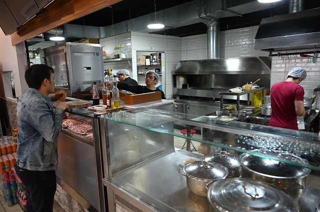 afghan employees of an afghan kebab restaurant are at work in esenyurt district in istanbul photo afp