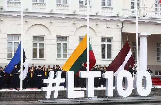 this picture shows from left to right flags of estonia lithuania and latvia at a flag rising ceremony next to the presidential palace during the country s centenary celebration in the country s capital of vilnius on february 16 2018 photo reuters this picture shows from left to right flags of estonia lithuania and latvia at a flag rising ceremony next to the presidential palace during the country s centenary celebration in the country s capital of vilnius on february 16 2018 photo reuters