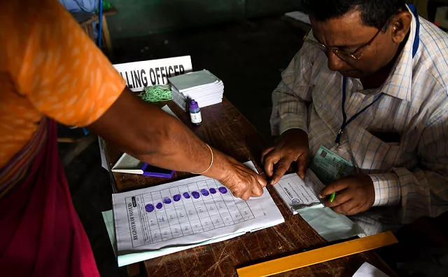 an indian voter gives her fingerprint as she comes to cast her vote at a polling station during india s general election in purandudam village some 140 km from guwahati the capital city of india s northeastern state of assam on april 11 2019 photo afp an indian voter gives her fingerprint as she comes to cast her vote at a polling station during india s general election in purandudam village some 140 km from guwahati the capital city of india s northeastern state of assam on april 11 2019 photo afp