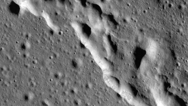 in this image taken by nasa 039 s lunar reconnaissance orbiter lro a mosaic composed of many images wrinkle ridges are seen in a region of the moon called mare frigoris photo afp