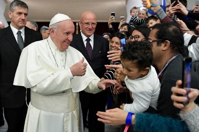 pope francis arrives to lead the weekly general audience in paul vi hall at the vatican photo reuters