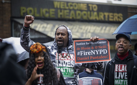people protest outside the police headquarters while a disciplinary hearing takes place for officer daniel pantaleo on 13 may 2019 in new york city photo afp