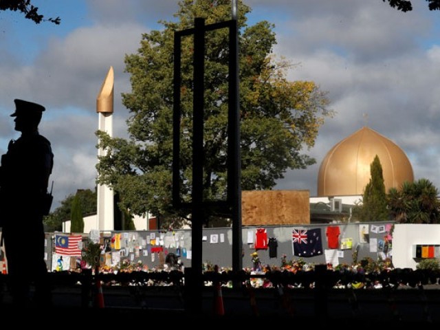 A police officer stands guard outside Al Noor mosque in Christchurch, New Zealand, March 22, 2019. PHOTO: REUTERS