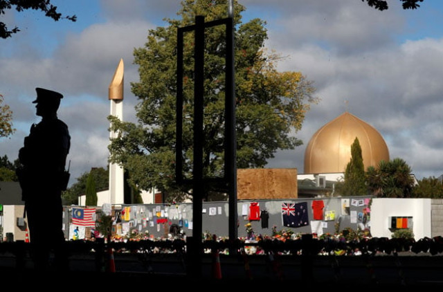 a police officer stands guard outside al noor mosque in christchurch new zealand march 22 2019 photo reuters