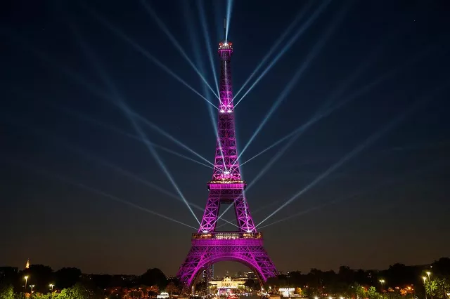a picture taken on may 15 2019 shows the eiffel tower during a light show celebrating the 130th anniversary of its construction in paris built for the 1889 world 039 s fair towering at 324 meters and weighing 7300 tons the eiffel tower attracts nearly seven million visitors every year photo afp a picture taken on may 15 2019 shows the eiffel tower during a light show celebrating the 130th anniversary of its construction in paris built for the 1889 world 039 s fair towering at 324 meters and weighing 7300 tons the eiffel tower attracts nearly seven million visitors every year photo afp