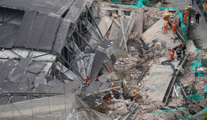 five killed in shanghai building collapse