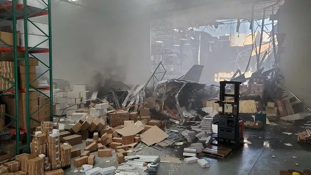 pilot ejected before f 16 jet crashed into warehouse just outside us air force base near los angeles photo twitter pilot ejected before f 16 jet crashed into warehouse just outside us air force base near los angeles photo twitter