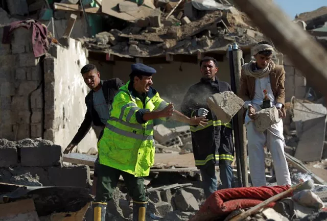 yemeni security forces look for survivors under the rubble of houses destroyed by saudi air strikes against huthi rebels near sanaa airport on march 26 2015 photo afp yemeni security forces look for survivors under the rubble of houses destroyed by saudi air strikes against huthi rebels near sanaa airport on march 26 2015 photo afp