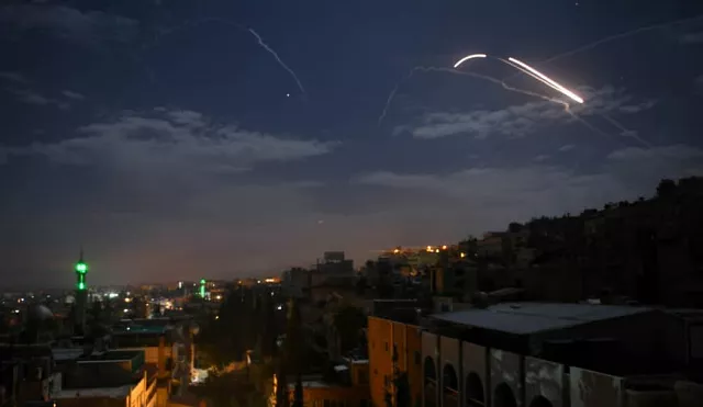 a picture taken early monday shows syrian air defense batteries responding to what the syrian state media said were israeli missiles targeting damascus photo afp a picture taken early monday shows syrian air defense batteries responding to what the syrian state media said were israeli missiles targeting damascus photo afp