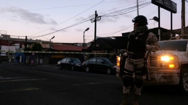 mexican soldiers guard a crime scene where a man was killed by gunfire in downtown tijuana one of many cities riven by drug cartel violence in the country photo afp file mexican soldiers guard a crime scene where a man was killed by gunfire in downtown tijuana one of many cities riven by drug cartel violence in the country photo afp file