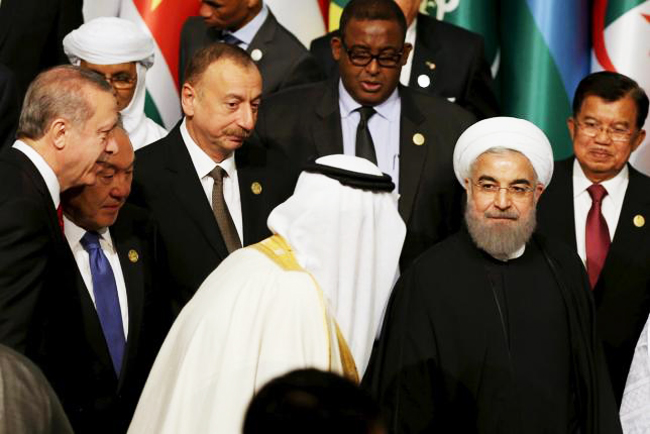 king salman of saudi arabia c is pictured with iranian president hassan rouhani front r during a family photo session at the organisation of islamic cooperation oic istanbul summit in istanbul turkey april 14 2016 photo reuters