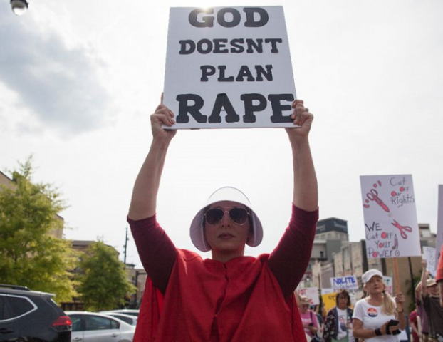some of the protesters in montgomery alabama dressed as characters forced to bear children of rape in the dystopian novel and television series quot the handmaid 039 s tale quot photo afp some of the protesters in montgomery alabama dressed as characters forced to bear children of rape in the dystopian novel and television series quot the handmaid 039 s tale quot photo afp