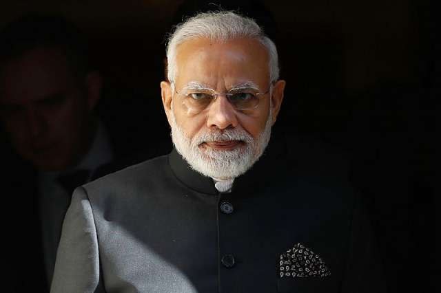 the 68 year old narendra modi makes much of his humble roots while unashamedly portraying himself as the tough guy protecting india 039 s national security and hindu values photo afp