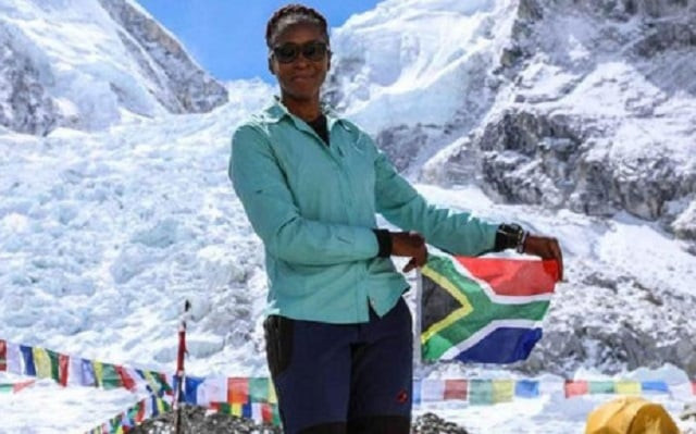 47 year old business executive says knowing her climb would be in the record books helped her push on to the top photo afp 47 year old business executive says knowing her climb would be in the record books helped her push on to the top photo afp