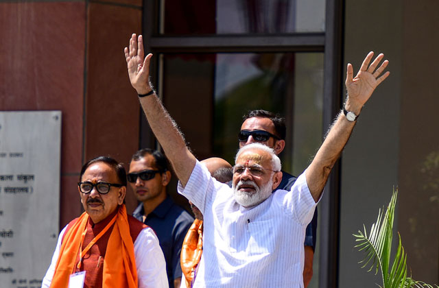 indian prime minister narendra modi waves to supporters in varanasi on may 27 2019 photo afp