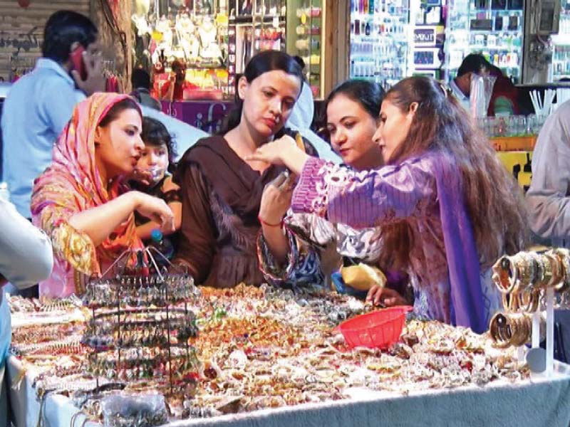 women busy in eid shopping in lahore photo express