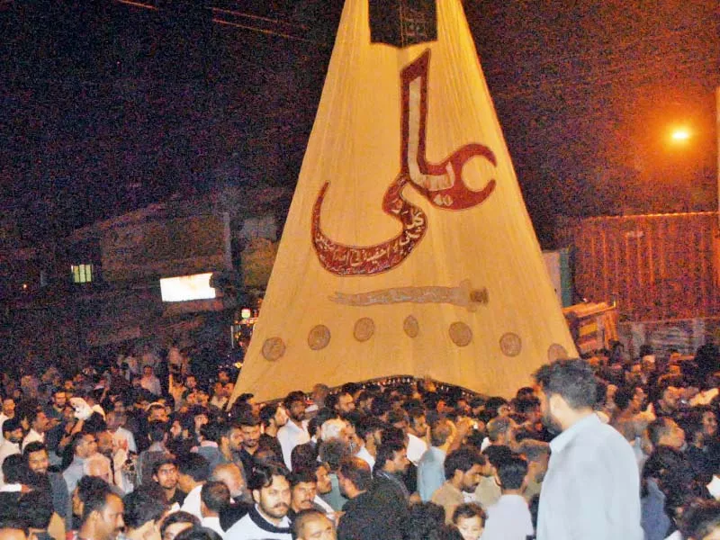 procession of youm e ali passes through a street in rawalpindi photo online procession of youm e ali passes through a street in rawalpindi photo online